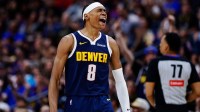 Denver Nuggets guard Peyton Watson (8) reacts after a play in the fourth quarter against the Dallas Mavericks at Ball Arena.