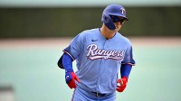 Rangers designated hitter Joc Pederson (3) rounds the bases