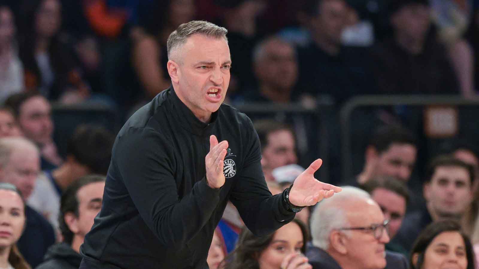 Raptors head coach Darko Rajakovic reacts during the first quarter against the New York Knicks at Madison Square Garden