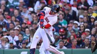 Boston Red Sox designated hitter Roman Anthony (19) hits a single against the San Diego Padres during the fifth inning at Fenway Park.