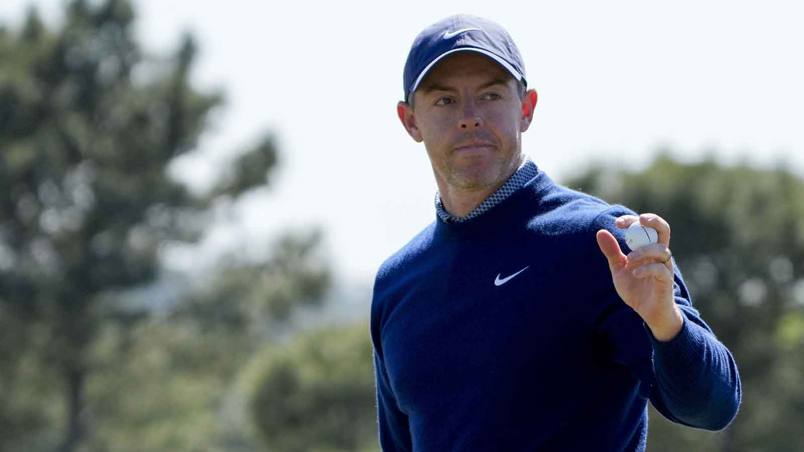 Rory McIlroy walks up the 18th hole during the first round of the Masters Tournament at Augusta National Golf Club.