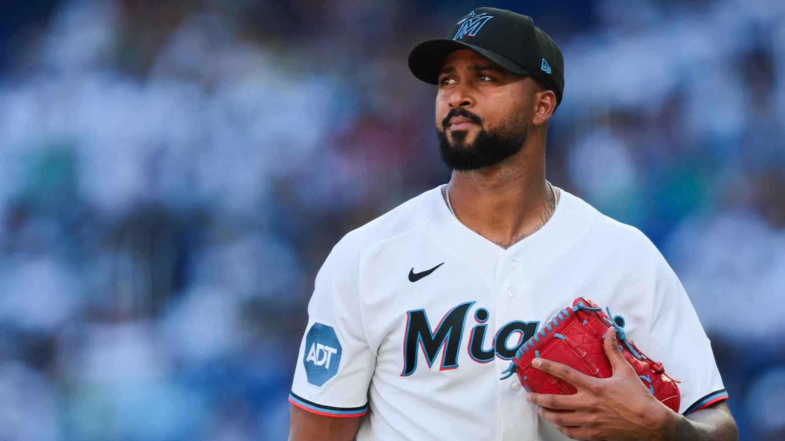 Miami Marlins starting pitcher Sandy Alcantara (22) returns to the dugout against the Milwaukee Brewers during the first inning at loanDepot Park.