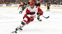Carolina Hurricanes center Seth Jarvis (24) skates with the puck against the Pittsburgh Penguins during the second period at PPG Paints Arena.