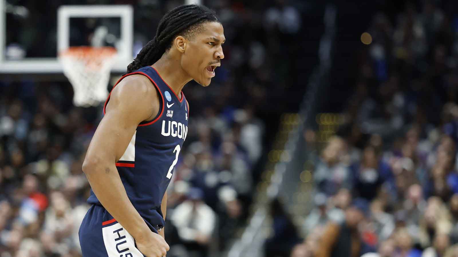 UConn Huskies guard Silas Demary Jr. (2) celebrates after scoring in the second half during against the Duke Blue Devils an Elite Eight game of the East Regional of the men's 2026 NCAA Tournament at Capital One Arena.