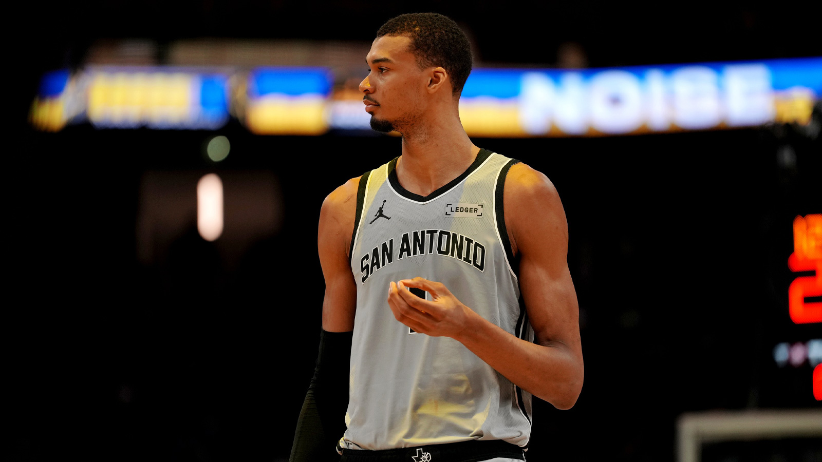 Spurs center Victor Wembanyama (1) stands on the court during a timeout against the Golden State Warriors in the fourth quarter at the Chase Center