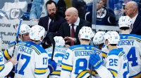 St. Louis Blues coach Jim Montgomery strategizes against the Winnipeg Jets during the third period at Canada Life Centre.