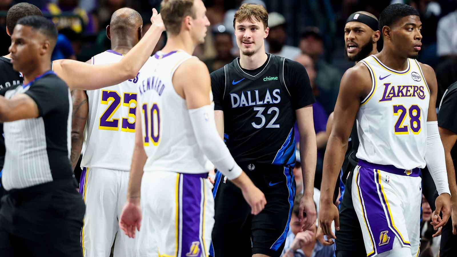 Dallas Mavericks forward Cooper Flagg (32) reacts after scoring against the Los Angeles Lakers during the second half at American Airlines Center.