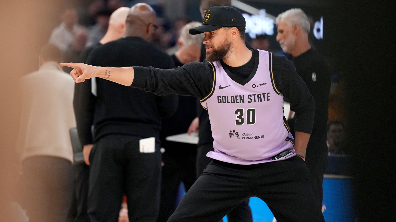 Golden State Warriors guard Stephen Curry (30) stands on the court during a timeout against the San Antonio Spurs in the second quarter at the Chase Center.