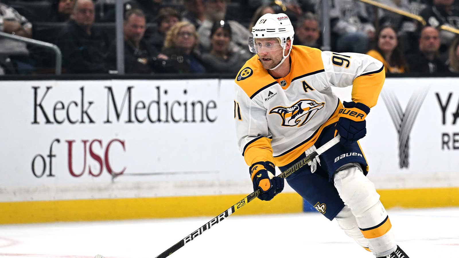 Los Angeles, California, USA; Nashville Predators center Steven Stamkos (91) skates with the puck during the third period against the Los Angeles Kings at Crypto.com Arena.
