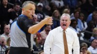 Texas head coach Vic Schaefer yells at an official at Mortgage Matchup Center during a Final Four semifinal game in Phoenix on April 3, 2026.