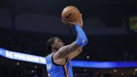 Thunder guard Jalen Williams (8) shoots a three point basket against the Los Angeles Lakers during the second half at Paycom Center