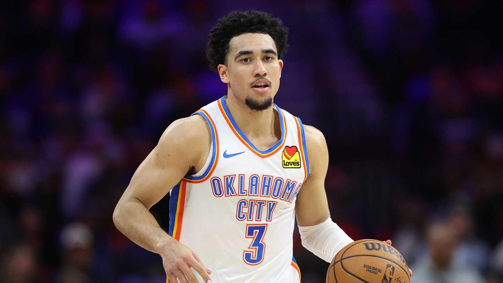 Thunder guard Jared McCain (3) dribbles the ball against the Philadelphia 76ers during the fourth quarter at Xfinity Mobile Arena