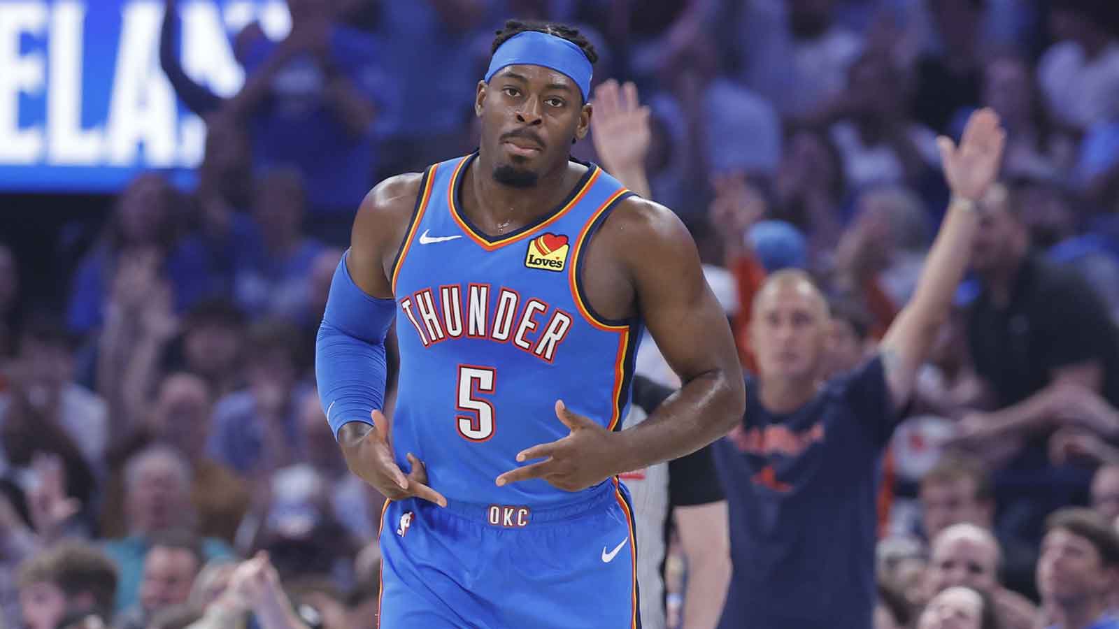 Thunder guard Luguentz Dort (5) celebrates after scoring against the Los Angeles Lakers during the first quarter at Paycom Center