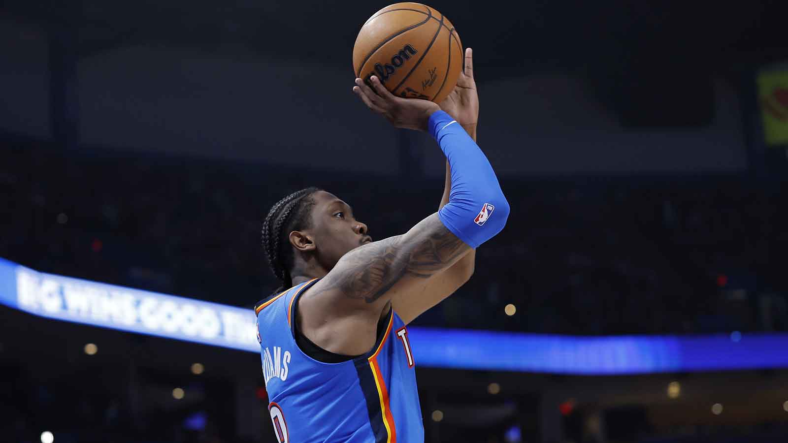 Thunder guard Jalen Williams (8) shoots a three point basket against the Los Angeles Lakers during the second half at Paycom Center
