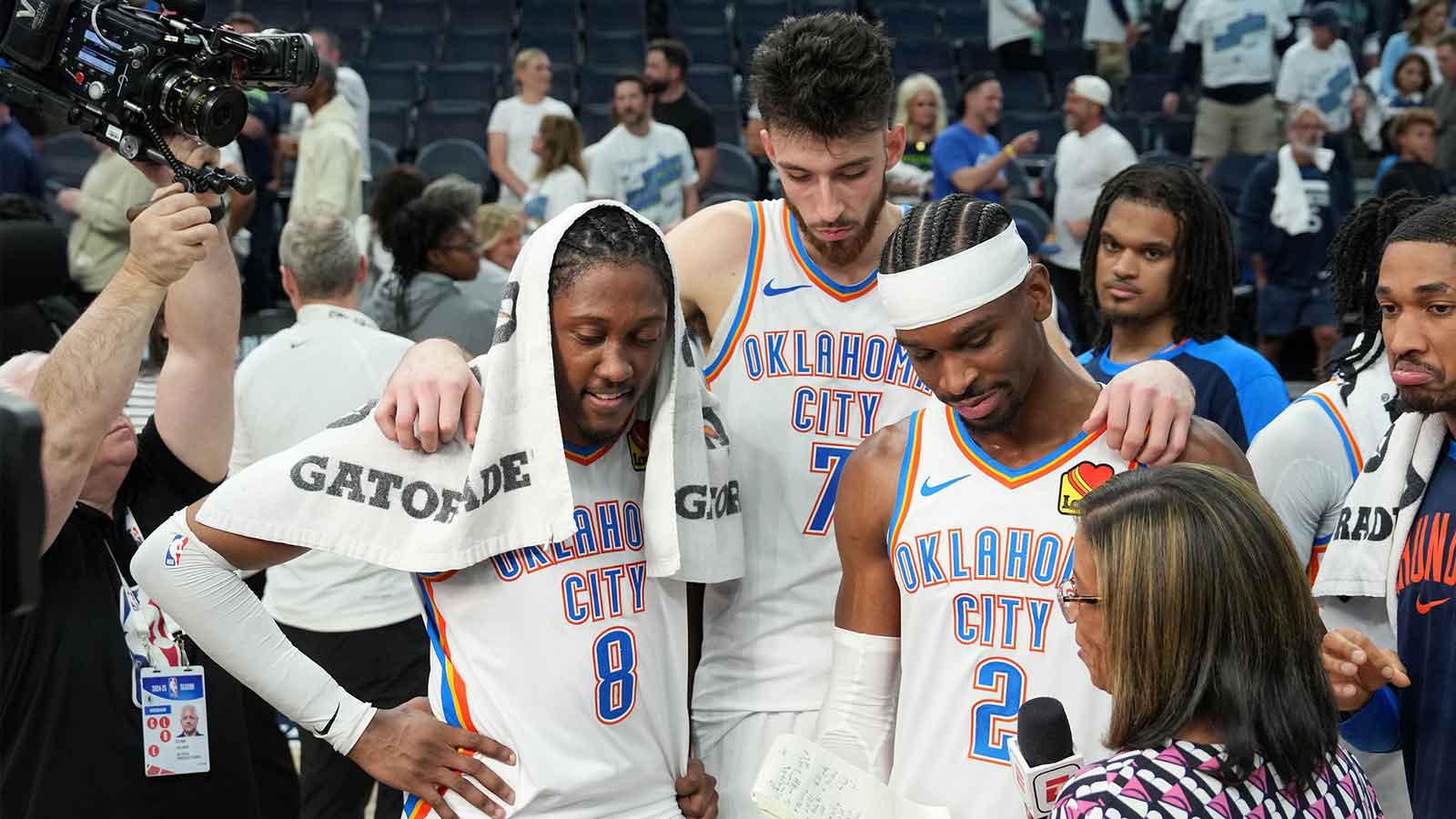 Thunder forward Jalen Williams (8), forward Chet Holmgren (7) and guard Shai Gilgeous-Alexander (2) talk to the media after defeating the Minnesota Timberwolves in game four of the western conference finals for the 2025 NBA Playoffs at Target Center