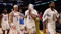 Thunder guard Jalen Williams (8) celebrates with guard Alex Caruso (9) after defeating the Los Angeles Lakers 119-110 at Crypto.com Arena