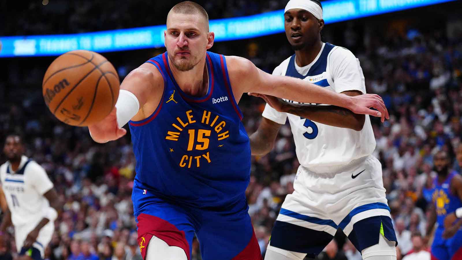 https://wp.clutchpoints.com/wp-content/uploads/2026/04/Timberwolves-Jaden-McDaniels-3-defends-Nuggets-Nikola-Jokic.jpg
