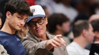 Tom Brady and his son, Jack at the Boston Celtics-Miami Heat game.
