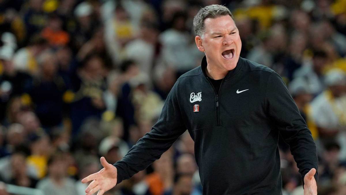 Arizona head coach Tommy Lloyd shouts toward the court in the first half of their Final Four game against Michigan at Lucas Oil Stadium in Indianapolis on Saturday, April 4, 2026.