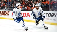 Toronto Maple Leafs right wing William Nylander (88) celebrates after scoring a goal with Toronto Maple Leafs right wing Easton Cowan (53) during the third period against the Anaheim Ducks at Honda Center.