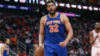 New York Knicks center/forward Karl-Anthony Towns (32) reacts after a play during the third quarter against the Houston Rockets at Toyota Center.