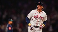 Boston Red Sox first base Triston Casas (36) hits a three run home run against the Seattle Mariners in the seventh inning at Fenway Park.