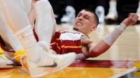 Miami Heat guard Tyler Herro (14) reacts against the Boston Celtics during the fourth quarter at Kaseya Center.