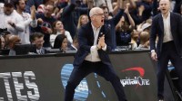 UConn Huskies head coach Dan Hurley celebrates after a play against the Duke Blue Devils in the second half during an Elite Eight game of the East Regional of the men's 2026 NCAA Tournament at Capital One Arena.