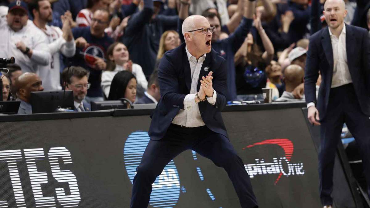 UConn Huskies head coach Dan Hurley celebrates after a play against the Duke Blue Devils in the second half during an Elite Eight game of the East Regional of the men's 2026 NCAA Tournament at Capital One Arena.