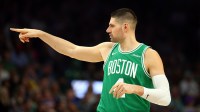Boston Celtics center Nikola Vucevic (4) reacts against the Phoenix Suns in the first half at Mortgage Matchup Center.