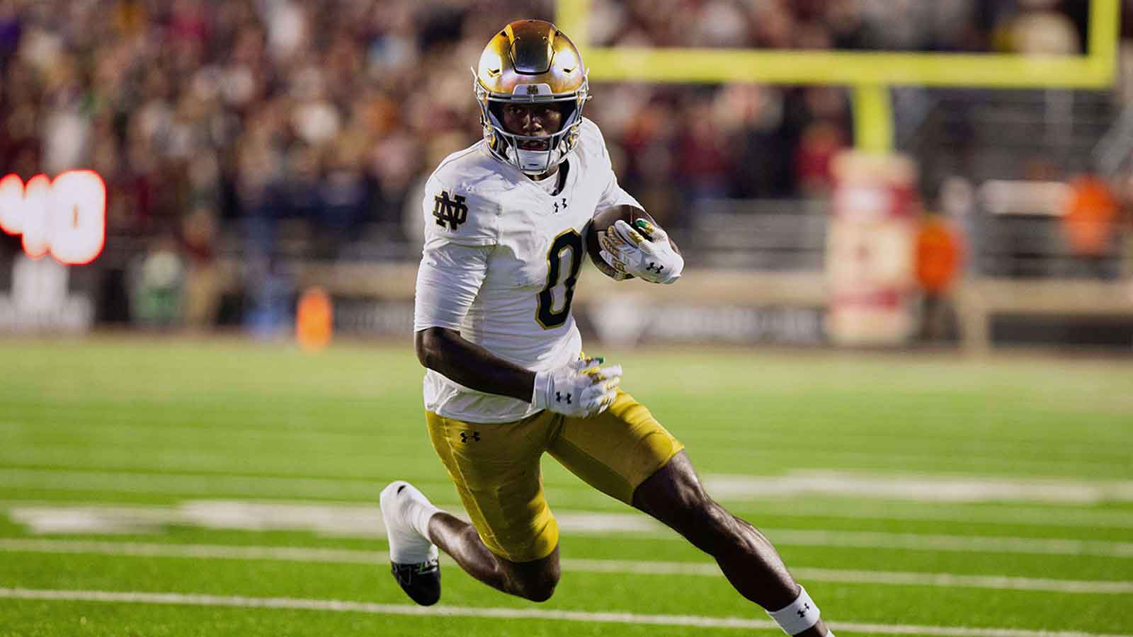 Notre Dame Fighting Irish wide receiver Malachi Fields (0) runs after a catch in the fourth quarter against the Boston College Eagles at Alumni Stadium.