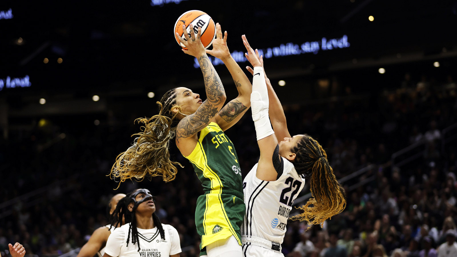 Seattle Storm forward Gabby Williams (5) shoots against Golden State Valkyries guard Veronica Burton (22) during the second half at Climate Pledge Arena.