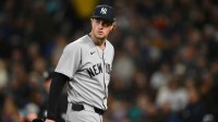 New York Yankees starting pitcher Cam Schlittler (31) walks off the field after being pulled from the game during the seventh inning against the Seattle Mariners at T-Mobile Park.