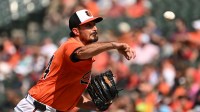 Baltimore Orioles starting pitcher Zach Eflin (24) throws a pitch against the Tampa Bay Rays during the first inning at Oriole Park at Camden Yards.