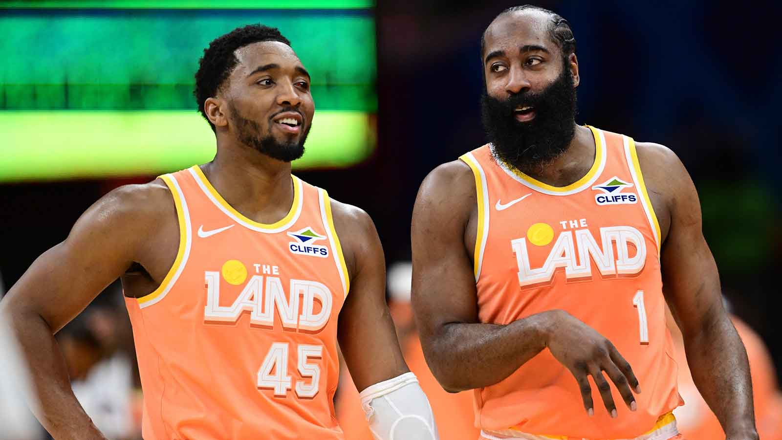 Cleveland Cavaliers guard Donovan Mitchell (45) and guard James Harden (1) talk during a free throw attempt during the second half against the Orlando Magic at Rocket Arena.
