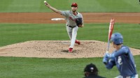 Philadelphia Phillies starting pitcher Zack Wheeler (45) pitches against Washington Nationals outfielder Robert Hassell III (57) during the second inning at Nationals Park.