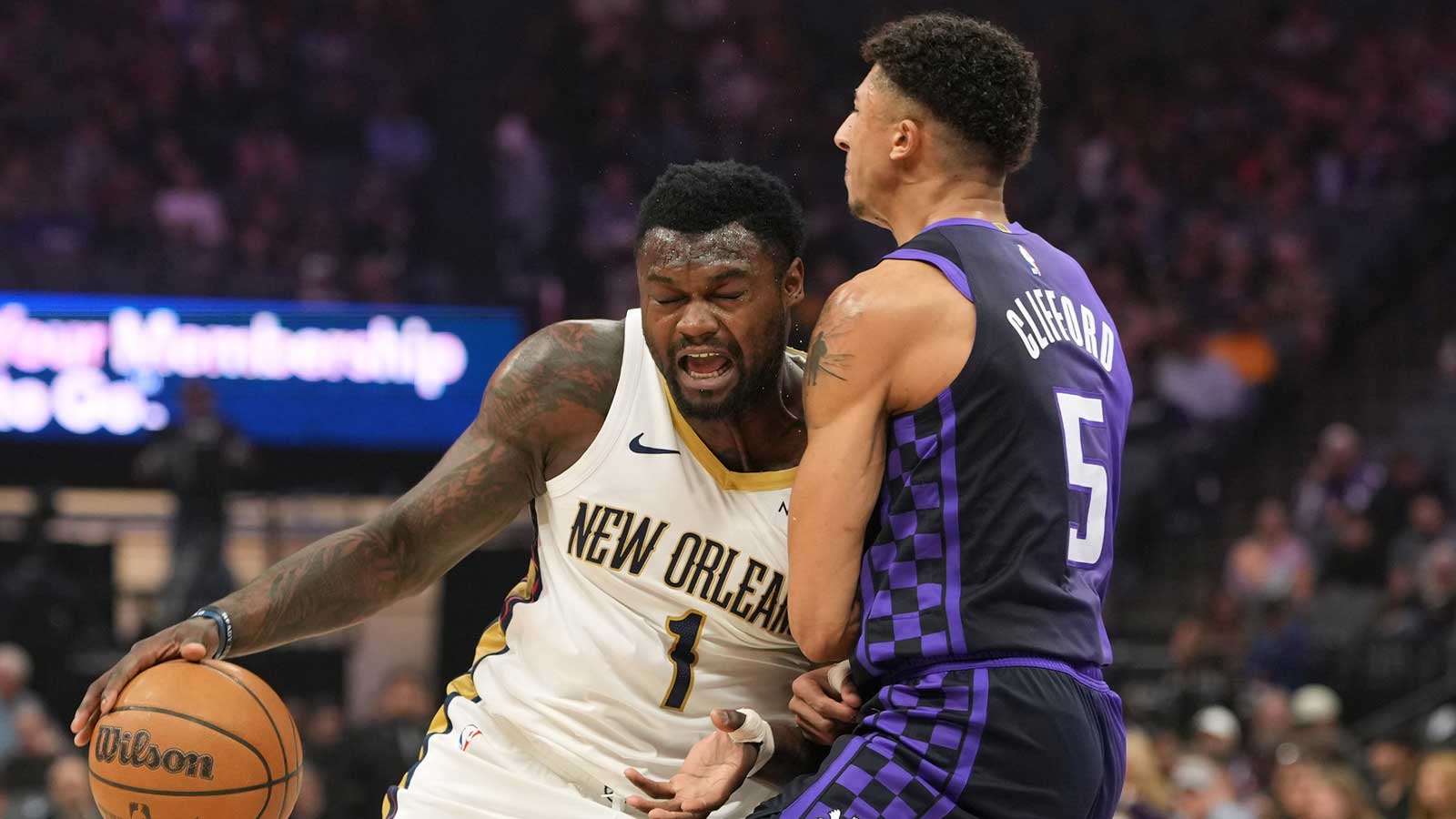 New Orleans Pelicans forward Zion Williamson (1) dribbles against Sacramento Kings guard Nique Clifford (5) during the first quarter at Golden 1 Center.