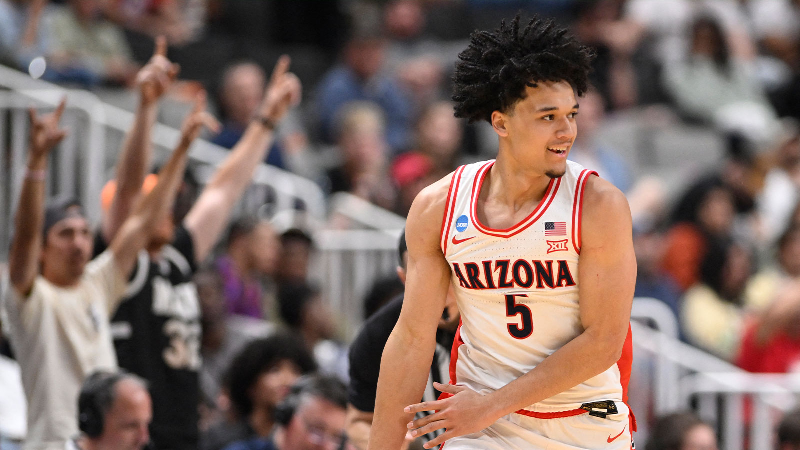 Arizona Wildcats guard Brayden Burries (5) celebrates after a play against the Arkansas Razorbacks in the second half during a Sweet Sixteen game of the West Regional of the men's 2026 NCAA Tournament at SAP Center.