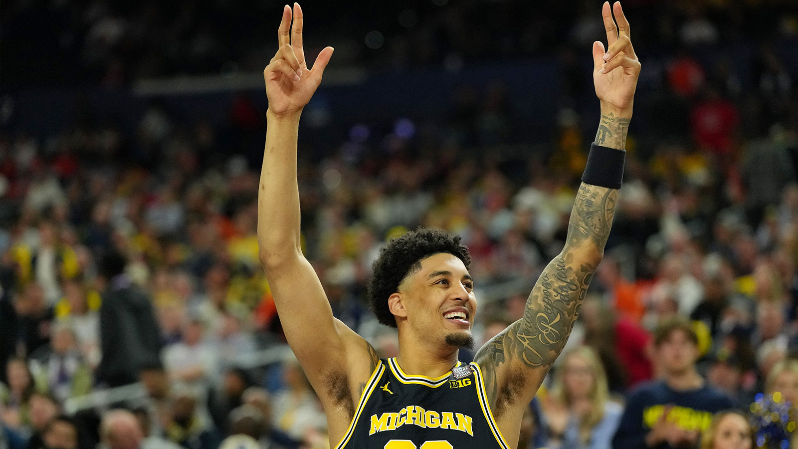 Michigan Wolverines forward Yaxel Lendeborg (23) celebrates against the Arizona Wildcats in a semifinal of the Final Four of the men's 2026 NCAA Tournament at Lucas Oil Stadium.