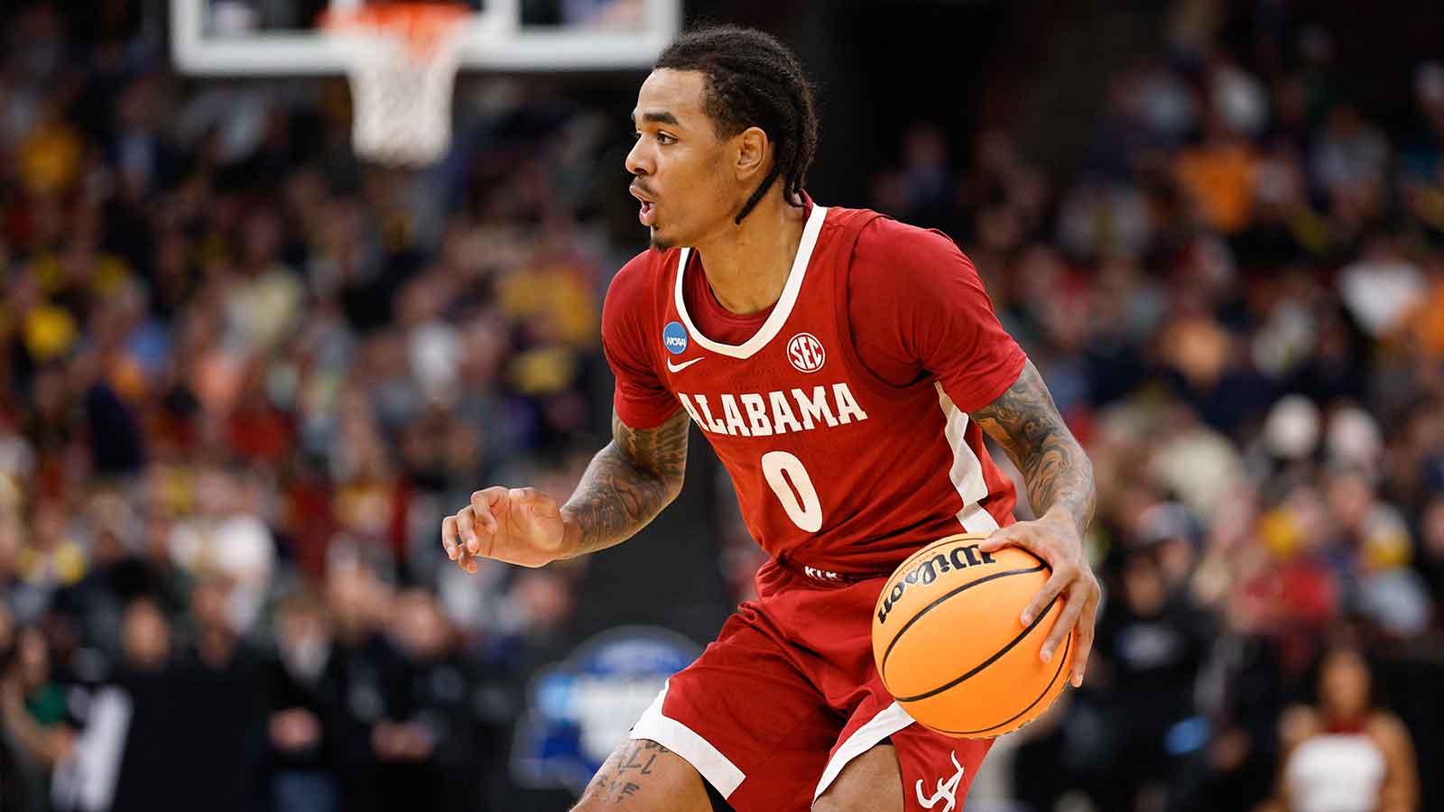 Alabama Crimson Tide guard Labaron Philon Jr. (0) controls the ball in the first half against the Michigan Wolverines during a Sweet Sixteen game of the Midwest Regional of the men's 2026 NCAA Tournament at United Center.