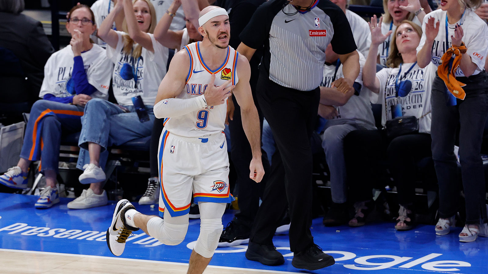 Oklahoma City Thunder guard Alex Caruso (9) reacts after a basket during the fourth quarter against the San Antonio Spurs in game five of the western conference finals for the 2026 NBA playoffs at Paycom Center. 