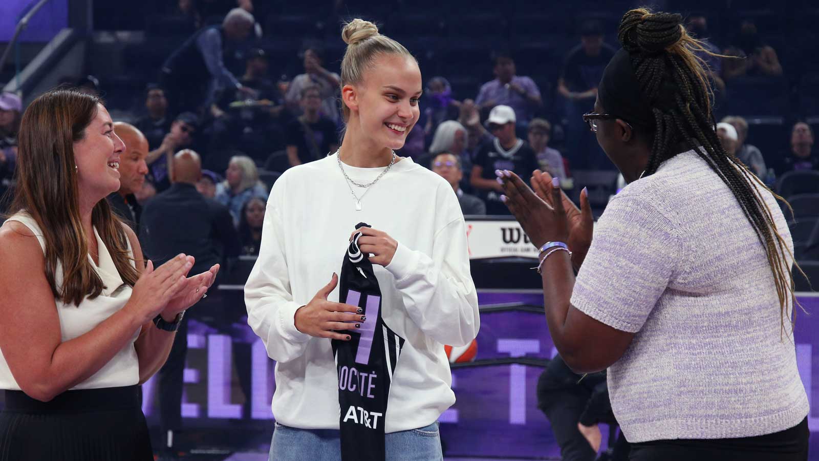 Golden State Valkyries president Jess Smith, 2025 number one draft pick (5th overall) Juste Jocyte, and general manager Ohemaa Nyanin share a laugh during a jersey presentation before the Atlanta Dream game at Chase Center. 