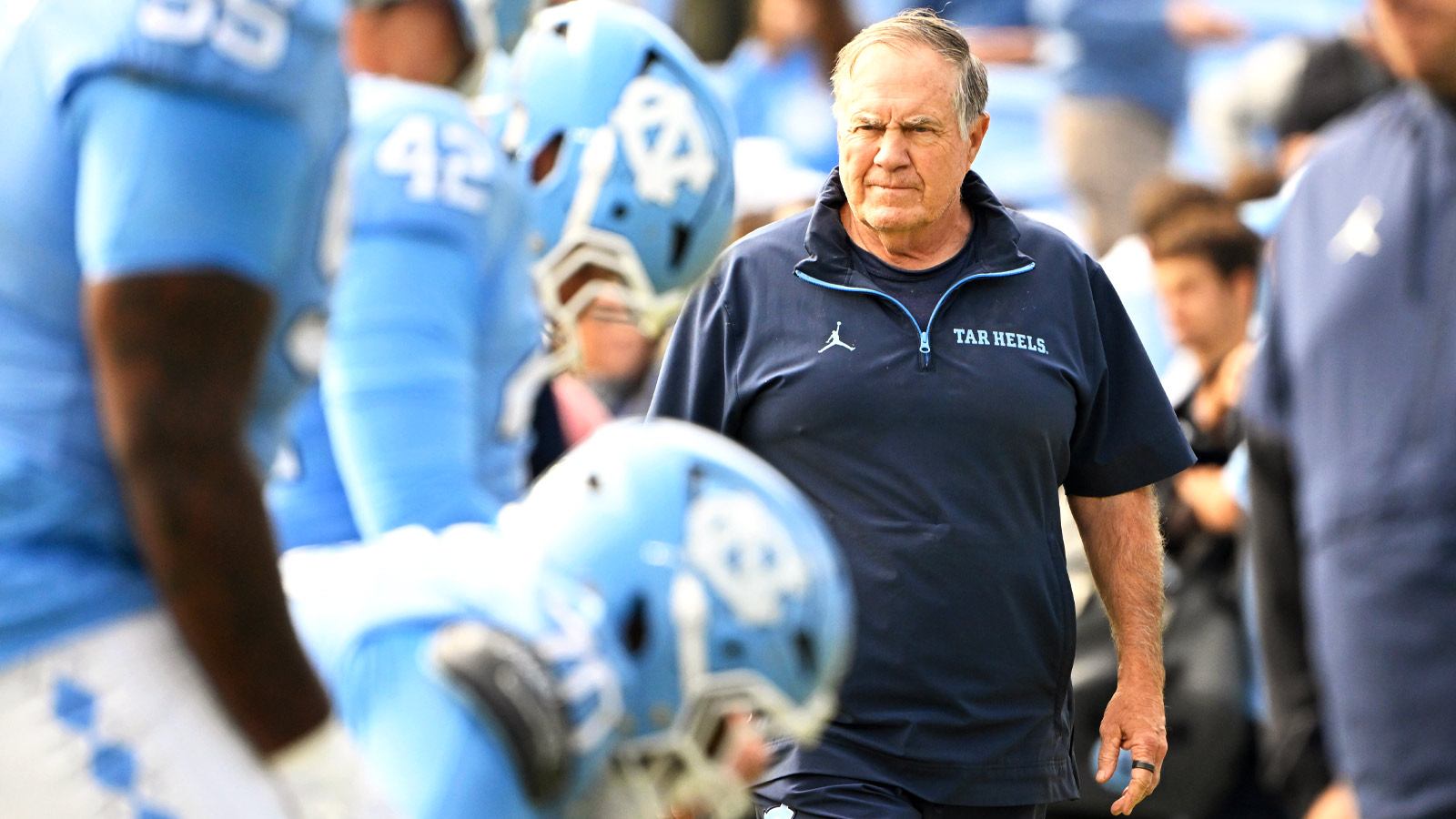 North Carolina Tar Heels head coach Bill Belichick with the team before the game at Kenan Stadium.