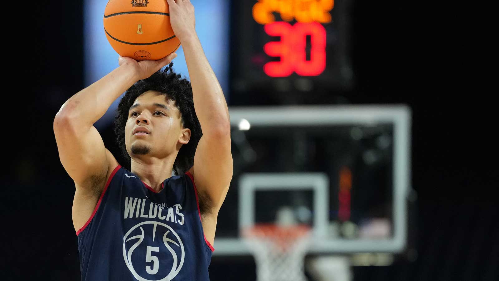Arizona Wildcats guard Brayden Burries (5) shoots the ball during a practice session ahead of the Final Four of the men's 2026 NCAA Tournament at Lucas Oil Stadium.