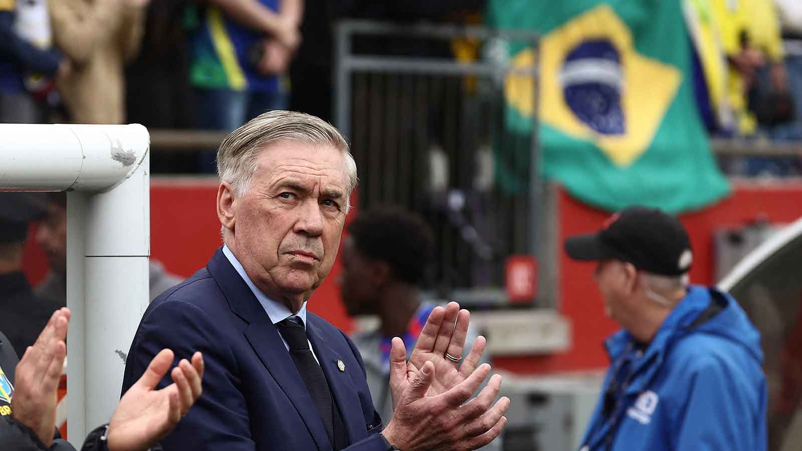 Brazil head coach Carlo Ancelotti applauds before their friendly against France at Gillette Stadium.