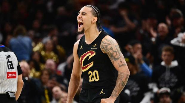 Cleveland Cavaliers guard Jaylon Tyson (20) reacts after a play against the Toronto Raptors during the second half of game seven in the first round of the 2026 NBA Playoffs at Rocket Arena.