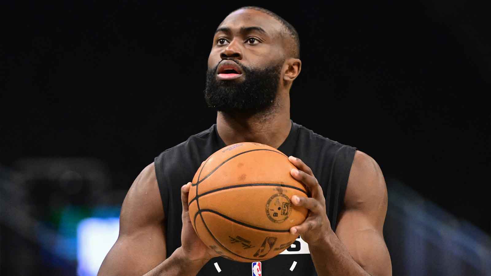 Celtics forward Jaylen Brown (7) warms up before the game against the Milwaukee Bucks at Fiserv Forum