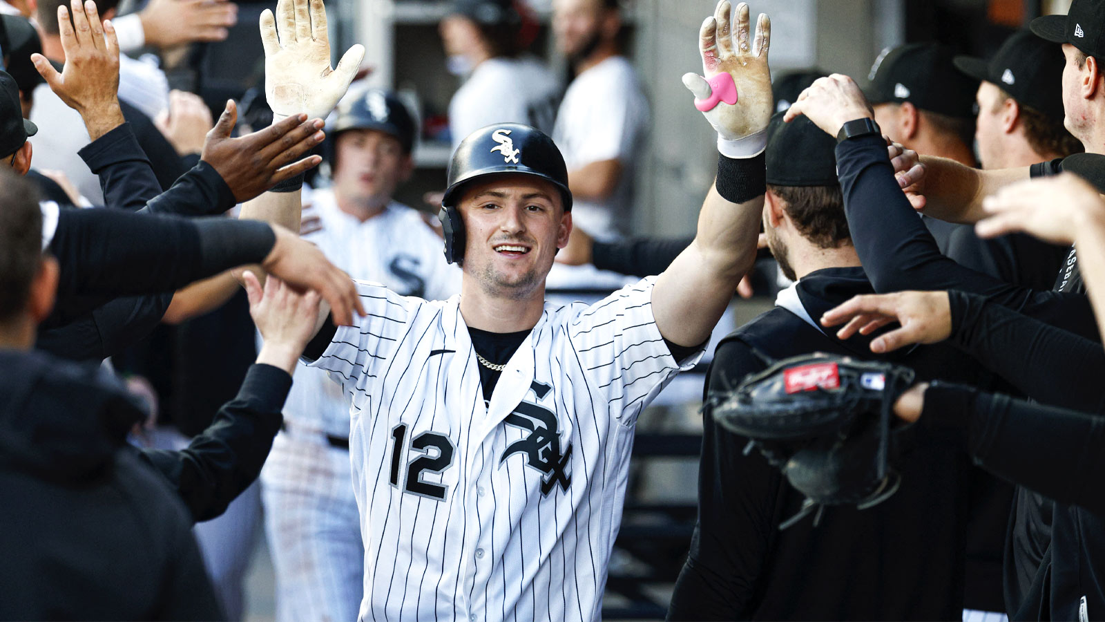 Chicago White Sox shortstop Colson Montgomery (12) celebrates with teammates in the dugout after hitting a two-run home run against the Seattle Mariners during the first inning at Rate Field