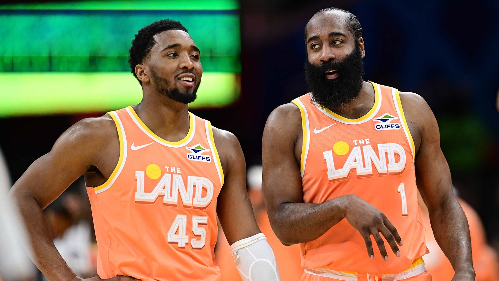 Cleveland Cavaliers guard Donovan Mitchell (45) and guard James Harden (1) talk during a free throw attempt during the second half against the Orlando Magic at Rocket Arena.