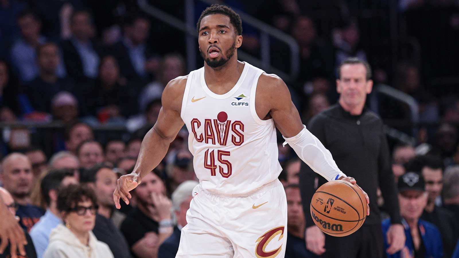 Cleveland Cavaliers guard Donovan Mitchell (45) dribbles up court against the New York Knicks during the second quarter of the eastern conference finals of the 2026 NBA playoffs at Madison Square Garden